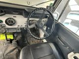 a car with a steering wheel and a dash board in it