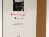 a close up of a book with a picture of a man in a top hat