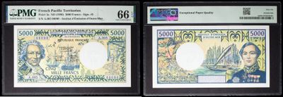 three different types of currency are on display in a display case