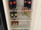 a refrigerator with a lot of drinks inside of it