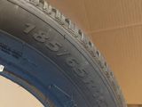 a close up of a tire with a box in the background