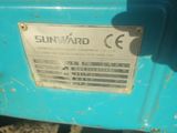 a sign that says sunward on the side of a blue truck