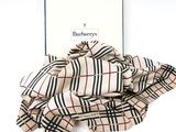 burberry ' s scarf in a gift box on a white background