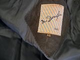 a close up of a jacket with a fur collar