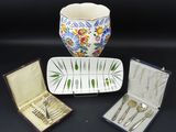 three different types of silverware in a case