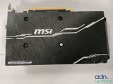 a close up of a black and white graphics card on a white surface