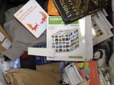 a bag full of books and other items in it