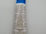 a close up of a tube of toothpaste on a white surface