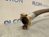 a close up of a metal pipe with a hose attached to it