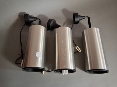 three speakers that are sitting on a table