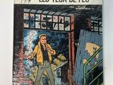 a close up of a comic book on a white surface