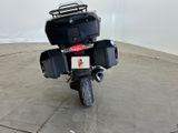 a motorcycle that is parked on the concrete floor