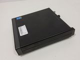 a black laptop sitting on top of a white table