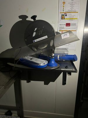 an image of a table with a cutting machine on it