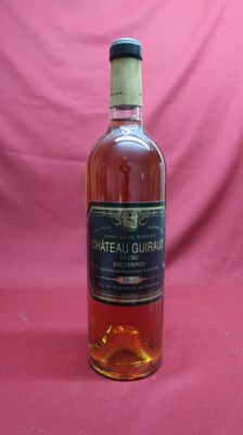 an image of a bottle of wine sitting on top of a table