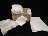 a box with a bunch of white cloths in it
