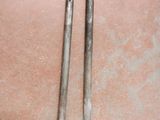 two tools that are sitting on a table