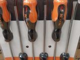 six screwdriver sets in the package on the shelf