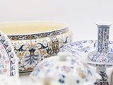 a lot of different types of pottery on the table