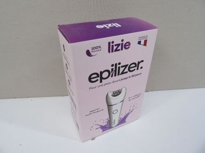 a box that has a razor on it on a table