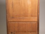 an old wooden chest with a drawer on top of it