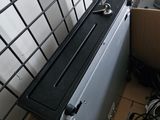 a metal box with a lock on top of it in a room