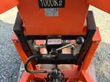 an image of a forklift sitting on the side of a road