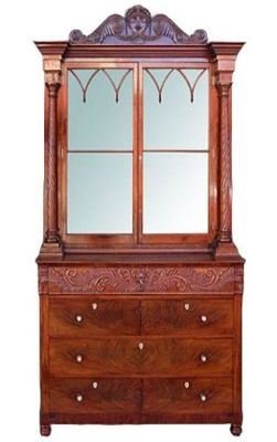 an image of a dresser with a mirror on top of it