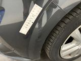 a sticker on the side of a car with a sticker attached to it