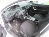 the interior of a car with a steering wheel and a dash board