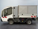 a white truck with a red stripe on the side of it
