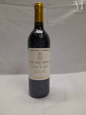 a bottle of wine that is sitting on a table