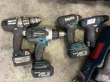 a lot of tools that are laying out on the floor