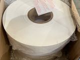a roll of toilet paper in a cardboard box