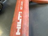 a red fire extinguisor sitting on a table