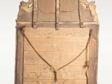 an old wooden door with a chain hanging from it ' s side