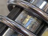a close up view of a motorcycle ' s shock absorbor