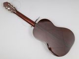 an acoustic guitar on a white background