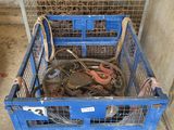 a blue crate with a bunch of tools inside of it