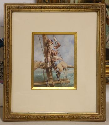 painting of a man on a boat in a gold frame on a table
