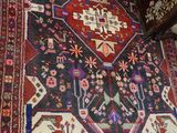 an oriental rug on the floor in a room