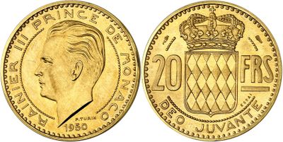 a close up of a gold coin with a crown on it