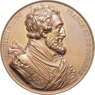 une image représentant une médaille de bronze à l'effigie d'un homme barbu et moustachu