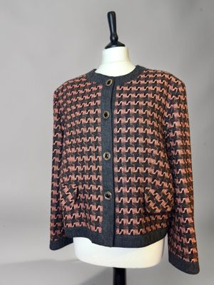 a brown and black jacket on a mannequin mannequin mannequin mannequin mannequin mannequin mannequin mannequin mann