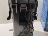 a juicer that is sitting on a table next to a box
