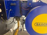 a blue and yellow machine that is on the side of a building