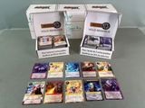two boxes of yu - gitsu cards are sitting on a table
