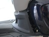 a close up of a motor scooter parked in a building