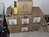 a blender sitting next to a pile of boxes on the floor