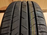 a close up of a tire on a box with a cardboard box in the background